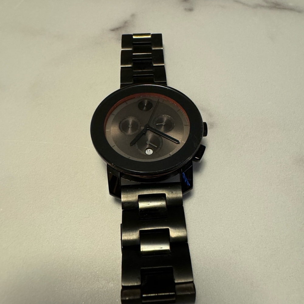 Movado Bold Black/Orange.  Discontinued.  SN# 12501312